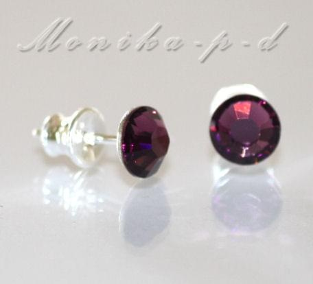 735. SWAROVSKI kolczyki wkrętki kolor Amethyst
kryształki o średnicy 6mm
wykończenie - srebro