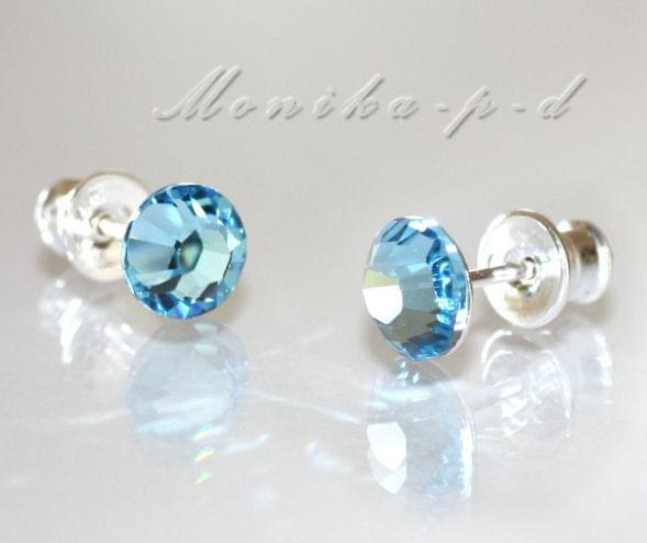 733. SWAROVSKI kolczyki wkrętki kolor Aquamarine
kryształki o średnicy 6mm
wykończenie - srebro